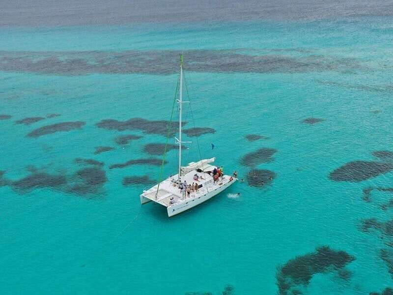 Isla Mujeres Catamaran Tour: Snorkel & Beach Adventure - The Catamaran Experience: Space, Shade, and How the Day Flows