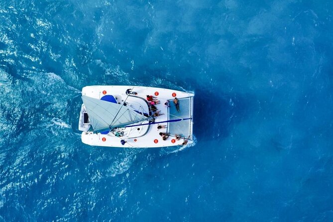 Isla Mujeres: Catamaran Tour with Snorkeling Food, Drinks, Beach - Snorkeling and the beach club: buffet food and drinks