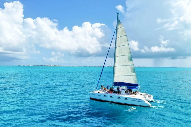 Isla Mujeres: Catamaran Tour with Snorkeling Food, Drinks, Beach - Is it worth it for families, groups, and first-time snorkelers?