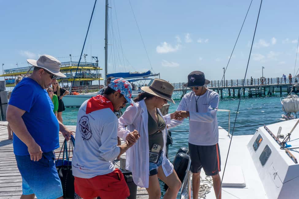 Isla Mujeres Catamaran Tour with Snorkeling & Open bar - Entering the Day: From Playa Tortugas to Isla Mujeres
