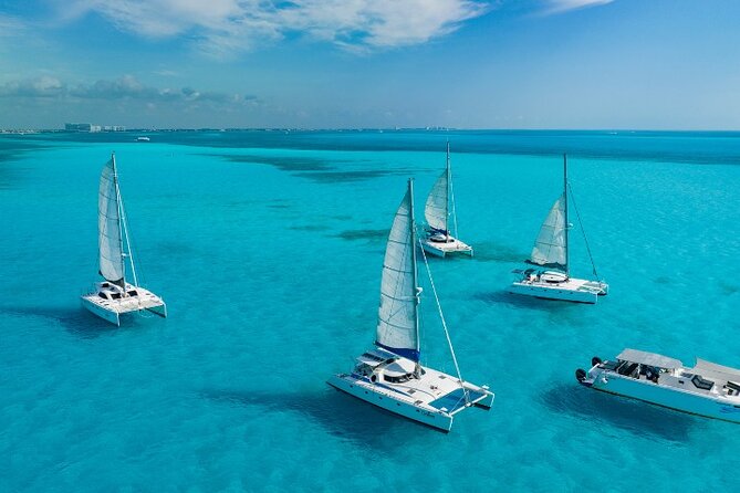 Isla Mujeres Catamaran Tour with Snorkeling, Open Bar & Buffet - Key Highlights Worth Knowing Before You Go