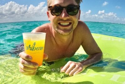 Isla Mujeres Catamaran Tour with Snorkeling, Open Bar & Buffet - Entering the Day: Pickup, Shared Transport, and Mobile Ticket