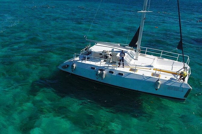 Isla Mujeres Premium Tour Transportation & Dock fee Included - IXI Beach Club lunch and the open-bar pacing