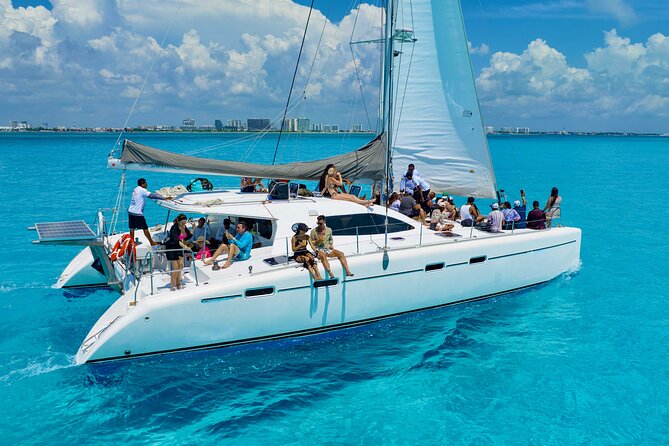 Isla Mujeres Spring Break Party Catamaran Snorkel and Open Bar - Playa Tortugas Marina: Where your catamaran day really starts