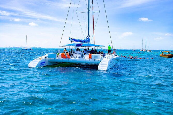 Isla Mujeres Tour on Catamaran with Snorkel, Open Bar, Buffet & Beach club - What You’re Paying (and Getting) for $77