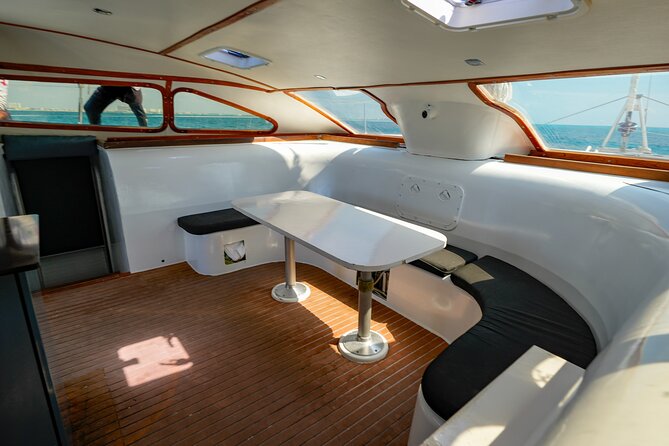 Laura Catamaran Private Tour to Isla Mujeres - Boarding the Catamaran: Views, Drinks, and a Crew That Sets the Pace