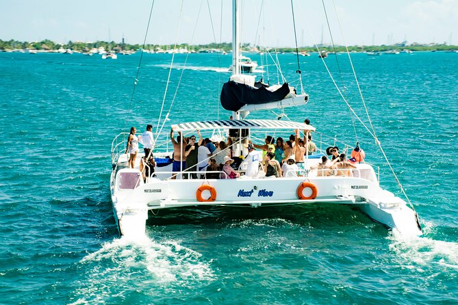 Live The Luxury Catamaran Isla Mujeres Tour in Cancun - Snorkeling at El Meco Reef: Included, Short, and Not Guaranteed