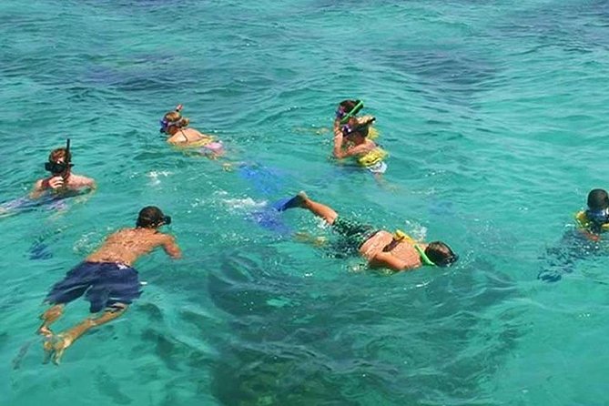 Live The Luxury Catamaran Isla Mujeres Tour in Cancun - Beach Club on Isla Mujeres: Lunch, Pool Chairs, and Shade