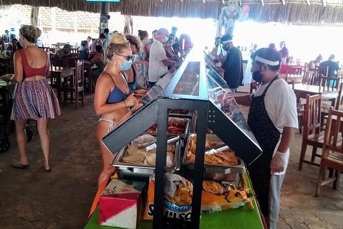 Live The Luxury Catamaran Isla Mujeres Tour in Cancun - Open Bar, Music, and Onboard Games: The Party Side of the Trip