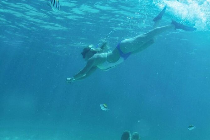 Luxury Catamaran Tour to Isla Mujeres with Transportation - Cancun to Isla Mujeres: a 7 to 8 hour day with clear pacing