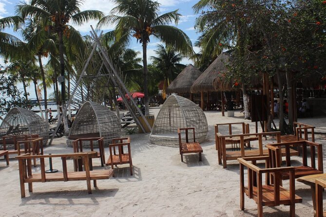 Luxury Catamaran Tour to Isla Mujeres with Transportation - Playa Norte and Isla Mujeres town time: swim, wander, and maybe rent a golf cart
