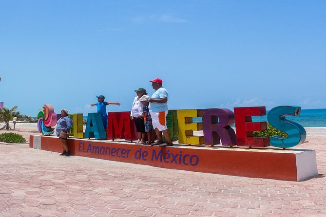 Mujeres Island Tour by Catamaran from Cancun City - Snorkeling expectations: time, water conditions, and what to do