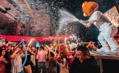 Neon Glow night Beach Party Regular - The production: fire, pyrotechnics, dancers, and champagne showers
