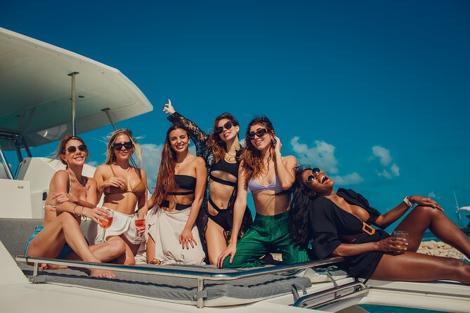 Private All Inclusive Sunset DJ Cruise – 51' Leopard Cancun - Playa Norte time: calm water play with inflatables and paddle boards