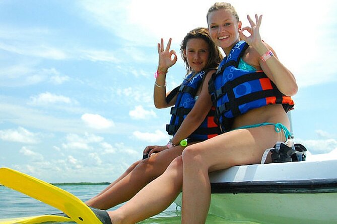 Speedboat Excursion: Thrilling Drive & Snorkel in Cancun Lagoon! - Snorkel Time in the Cancun Lagoon: Gear, Life Jackets, and Fish Close-Up