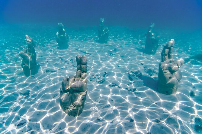 Trip to Isla Mujeres by Catamaran, with snorkeling and drinks - Spinnaker Flying (Weather Permitting): The Fun Extra